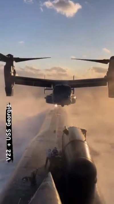 Ohio class USS Georgia (SSGN-729) &amp;amp; a hovering V-22 Osprey