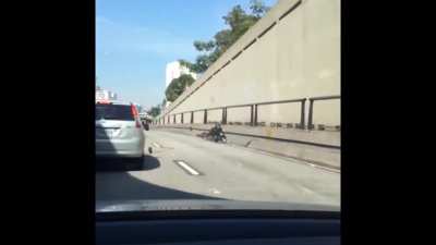WCGW kicking a car while on a motorcycle