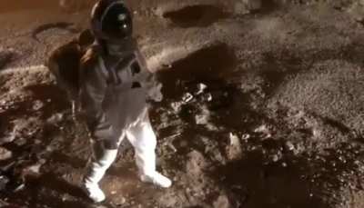 Indian man protesting potholes on roads