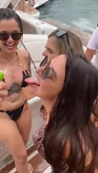 3 friends on the boat having fun