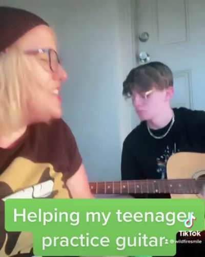 Helping my son learn guitar by doing bad covers.
