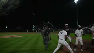 [Highlight] Tim Anderson meets his teammates at home base in a scene that seems straight out of The Sandlot.