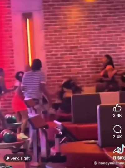 Woman Throws Bowling Ball at Somebody’s Head