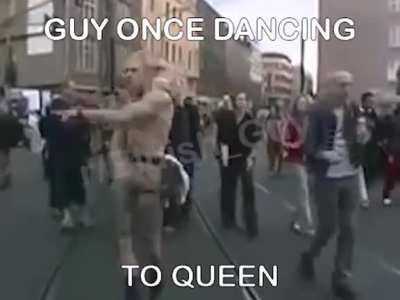 Guy ONCEs dancing to queen