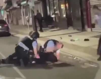 The cop literally put that man's hand on the stick just so he could have a reason to beat him up