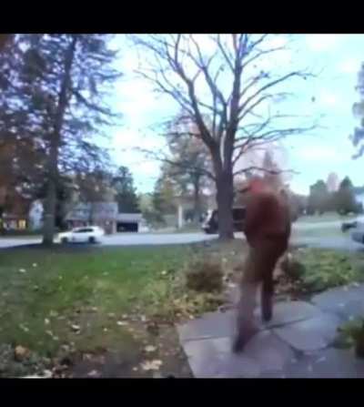 UPS Driver Dropping A Package Off