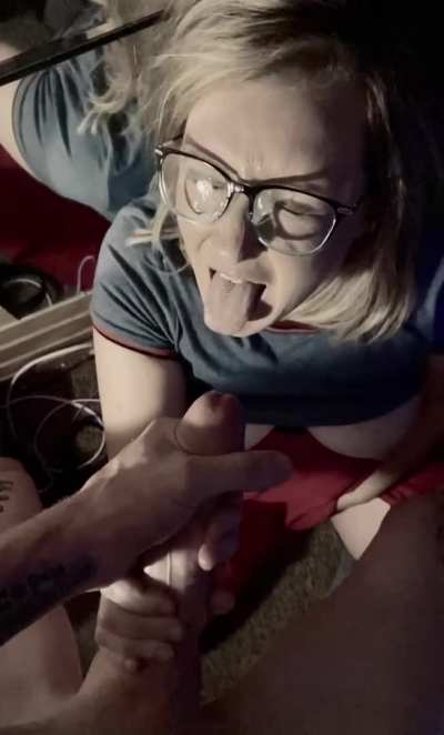 Putting my cum all over her beautiful face and glasses