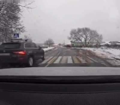 Crossing guard turns hero saving childs life from piece of shit driver.