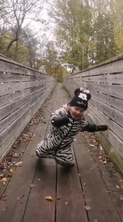 Running on a wet wooden bridge.