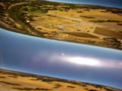 Camera falls from airplane and lands in pig pen.