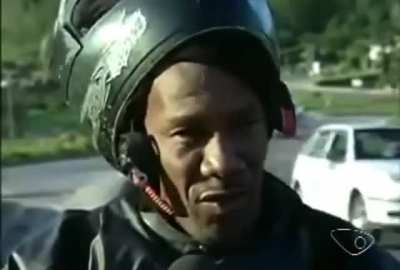 Chaos ensues during an interview about safety conditions on a Brazilian road.