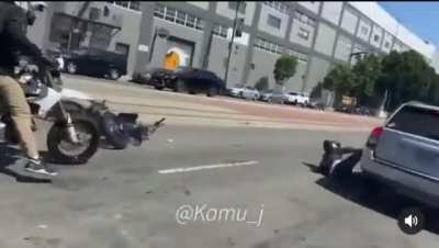 Blindly wheelie-ing down the street