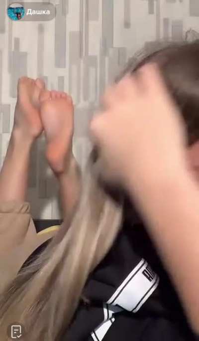 @dashkaaa_zxzxz live on TikTok right now, showing her soles!