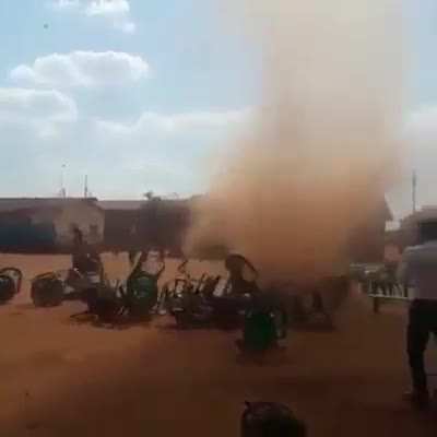 Dust Devil vs a Lot of Plastic Chairs