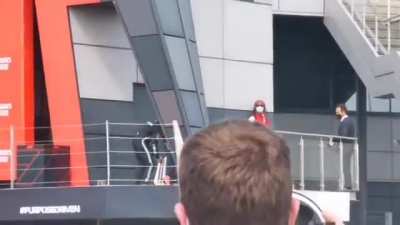 Hamilton walks off with P1 trophy at 70th Anniversary Grand Prix (View from below podium)