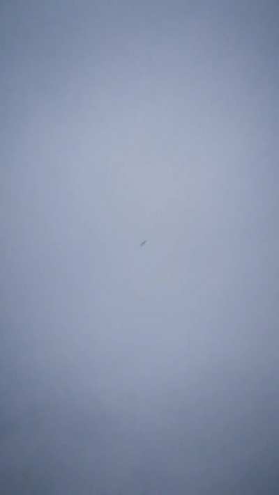Russian missle flying over a girl in Ukraine