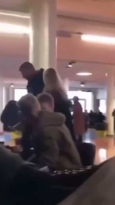 Boxer disrespected by wife at Yemen airport, suddenly remembers the rules regarding women's rights are different here. While hearing the commotion, a member of staff brings him an optional chair to use on her.