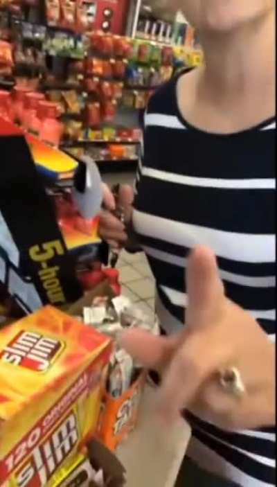 Native American woman puts racist Karen in her place.