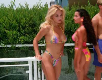 Pamela Anderson wearing a bikini that screams early-1990s in an episode of Baywatch.