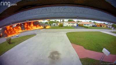 A light planed crashes into an SUV in a suburban street