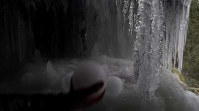 Found a waterfall that forms ice balls