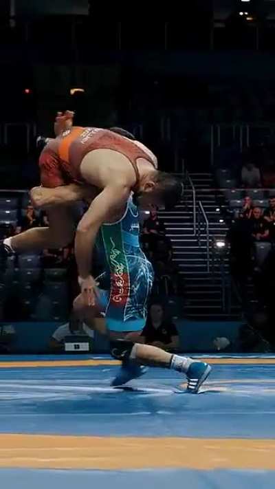 Mukhammad Abdullaev sprawls on Kamran Ghasempour's takedown attempt, so Ghasempour lifts him up and readjusts the finish mid-air