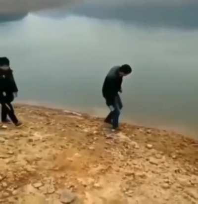 By the lake skipping stones
