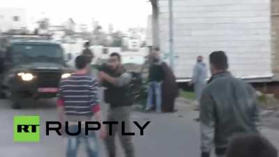 Israeli Soldier throw Disabled Palestinian off his wheel chair