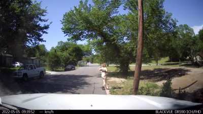 Crack head strips and leisurely walks down the road nude in front of my truck.