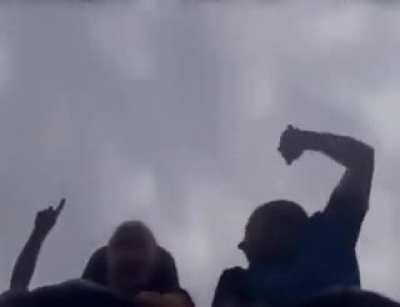 Catching someone's phone during a rolercoaster ride