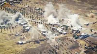 Exchange of artillery fire today between Syrian rebels and pro-Assad forces. Drone view of rebel side bombarding Dara Kebira village, S. Idlib front, Syria [July 17th, 2022]