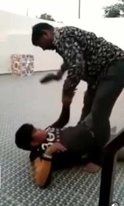 Kid gets a lesson from his father