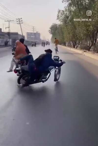 Idiot Dancing on a Bike