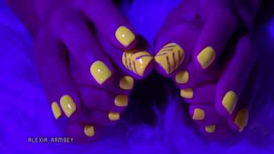 My yellow painted toes under Purple light! Alien 👾 feet