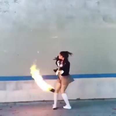 The way this girl is able to maneuver the fireball