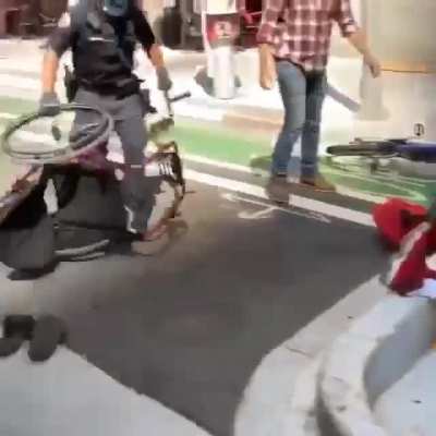 In downtown Los Angeles, cops are tough on BLM demonstrators. Even wheelchair users get it.