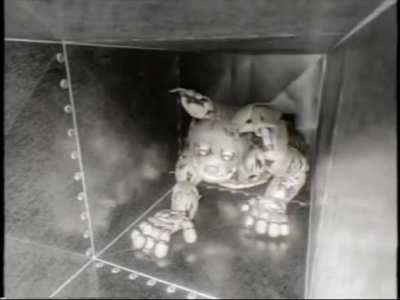 Springtrap strolling by the low framerate vent camera