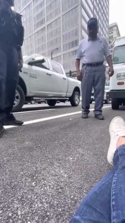 Bicycle Karen stops a USPS employee from retrieving mail. Supporting friend offers up some all lives matter energy to the responding black police officer