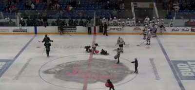 Line Brawl in NAHL game between the Odessa Jackalopes and Shreveport Mudbugs. Both coaches ejected, fights started in the middle of a line change so 7 players on the ice for both sides.