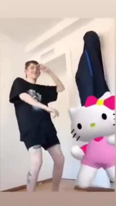 Un capo el Dillom, bailando con la minita