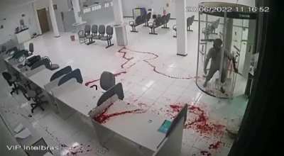 Security guard is ambushed, shoots guy in the neck, and is also shot. Attacker dies while unintentionally making a splatter painting.