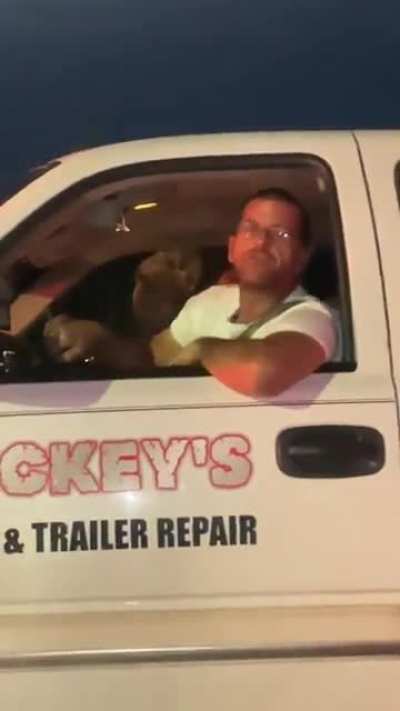 Road rage incident leads to man yelling all lives matter from his company truck.