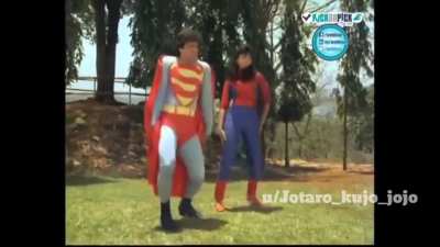 I did not know that Superman did a part time job as a dancer. Don't ask me what spider woman is doing with him.