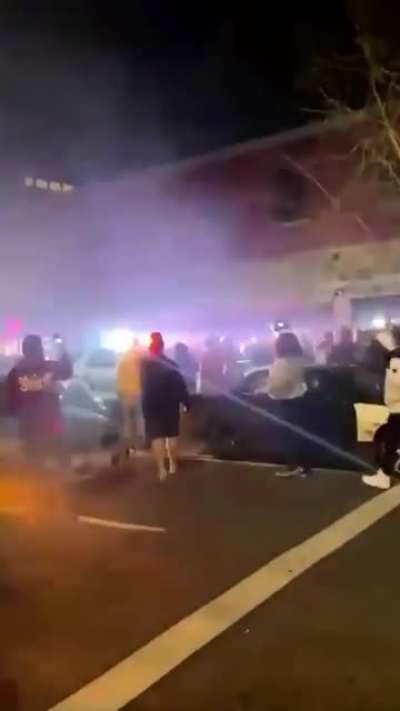 Police in Tacoma, Washington use an SUV to run over a crowd of pedestrians