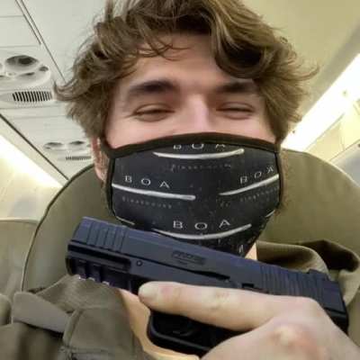 Even on a plane, he got that thang on him