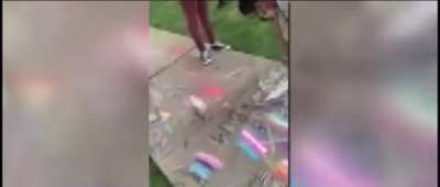 Teacher writes &lsquo;Heteros Rule&rsquo; over students&rsquo; gay pride chalk art