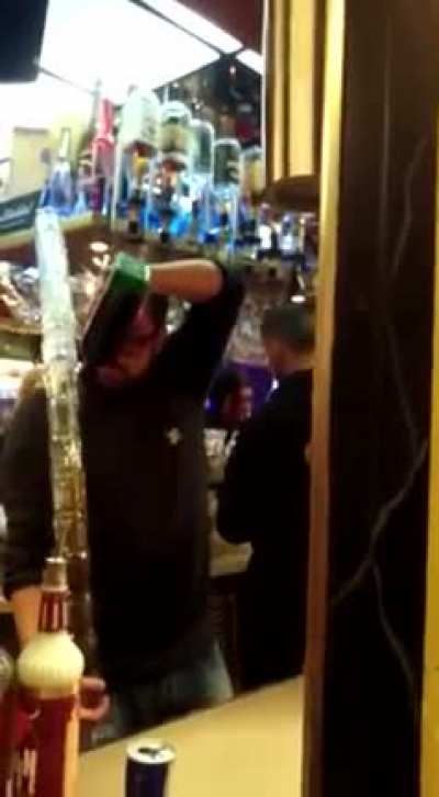 Bartender creating multiple J&auml;gerbombs