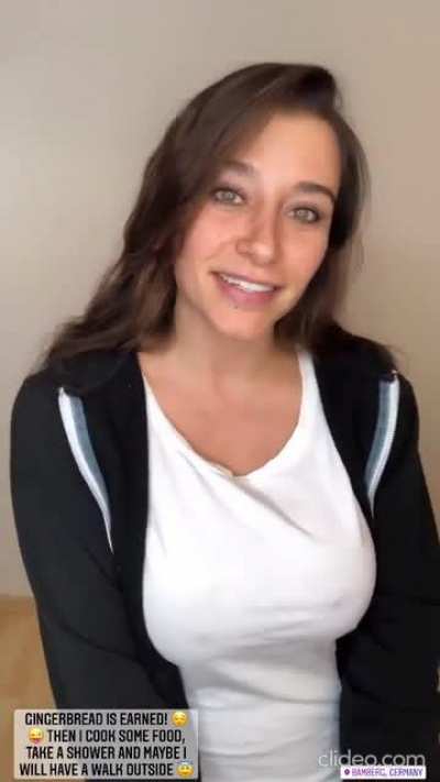 braless and smiling