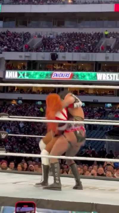 I&rsquo;m so Thankful for these crowd angles of Becky Lynch being folded into the pretzel pin