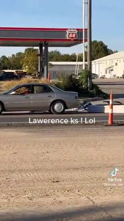 Idiots on cars.